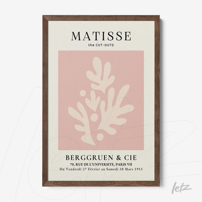 framed artwork inspired by Matisse featuring abstract organic shapes on a pink background with a dark wood frame