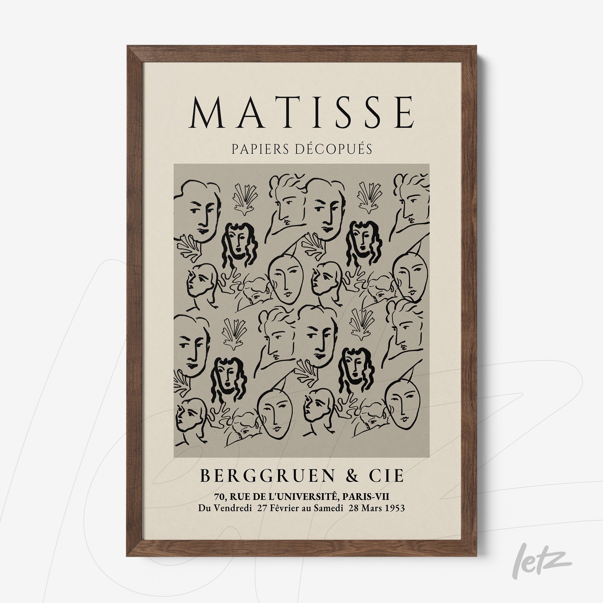 framed artwork featuring minimalistic line art of faces on a neutral background with a dark wooden frame