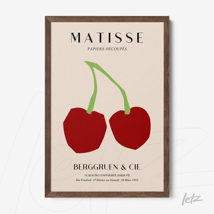 decorative wall art featuring modern illustration of two red cherries on beige background with dark wooden frame