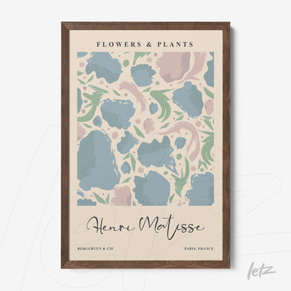 framed wall art featuring abstract flower patterns in shades of blue and pink on a light background with dark wood frame