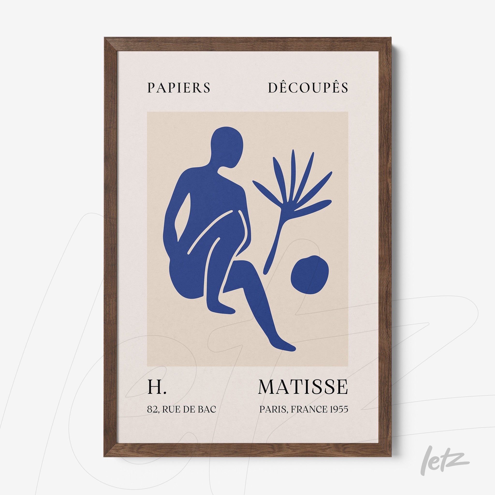 framed modern art featuring a blue silhouette of a human figure and a plant, set against a light background with a dark wood frame
