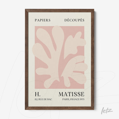 framed wall art featuring pastel-colored stylized leaves design in dark wood frame