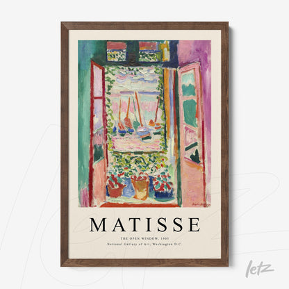 framed artwork by henri matisse depicting an open window with vibrant colors and floral pots