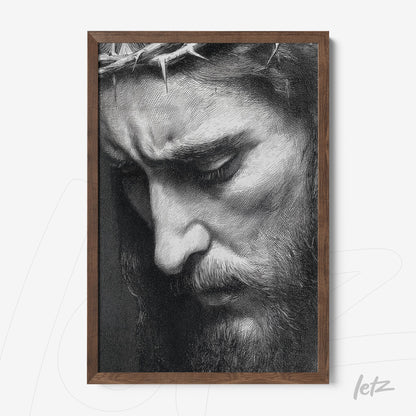 framed wall art featuring a black and white portrait of a bearded man in profile with a contemplative expression