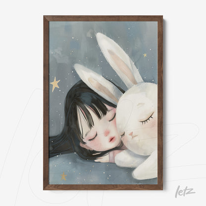 framed artwork of a girl sleeping next to a white bunny with a dark wood frame