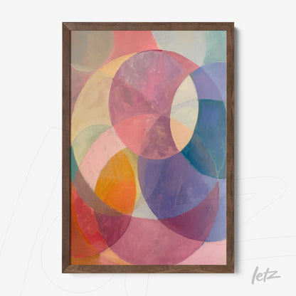 abstract wall art featuring pastel circular shapes on a soft background in dark wood frame