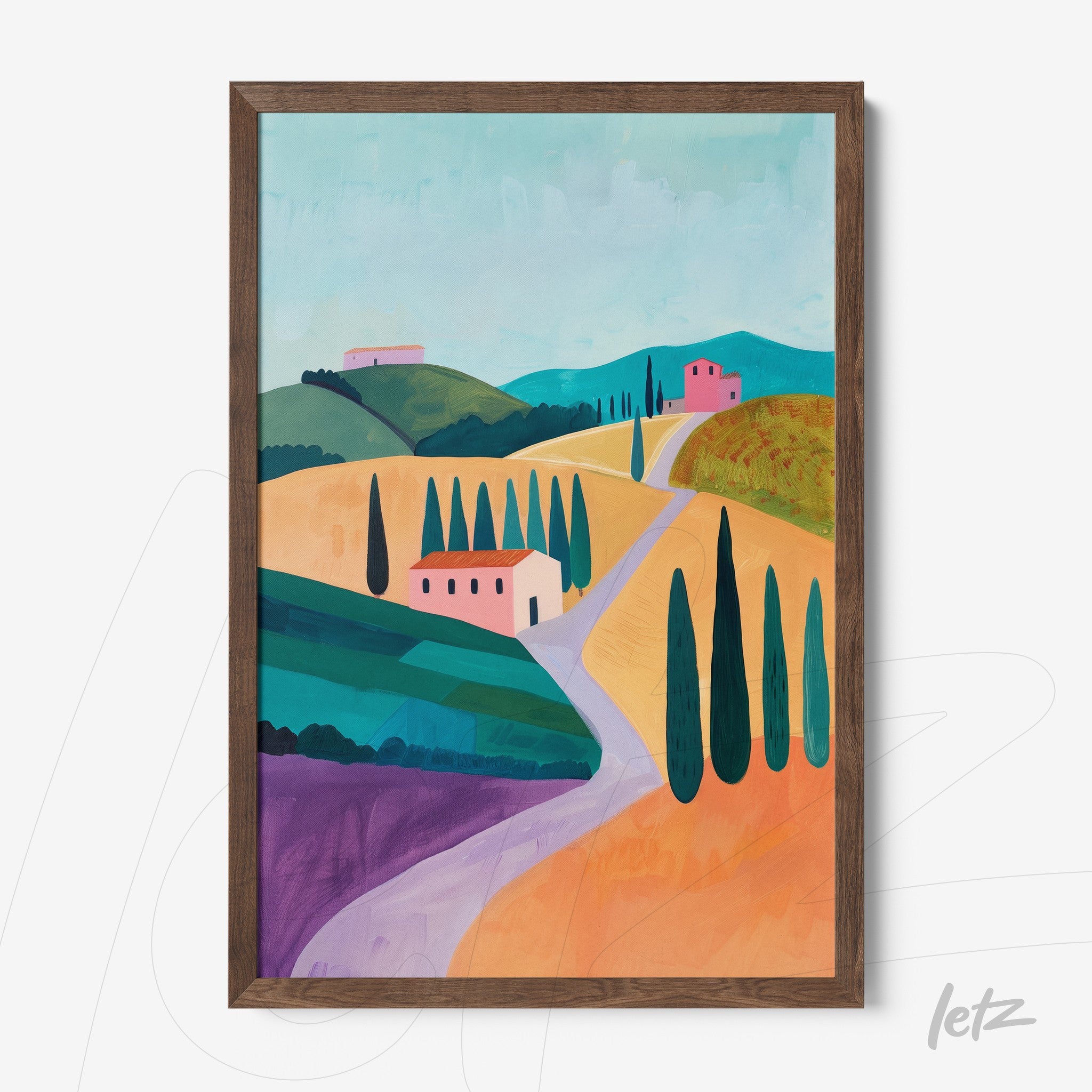 framed artwork of colorful rural landscape featuring hills, trees, and houses with dark wood frame