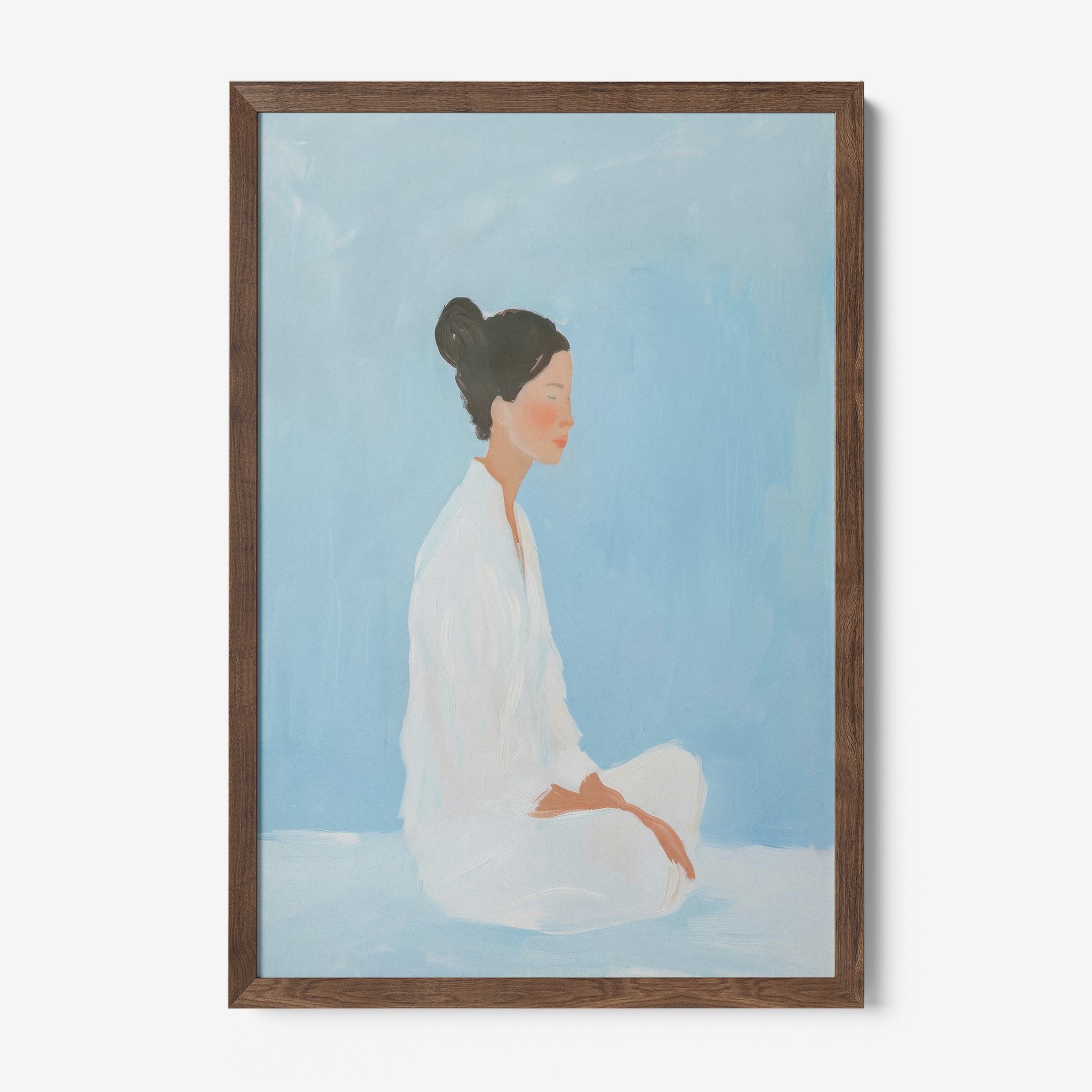 framed artwork featuring a sitting woman against a blue background with a dark wood frame