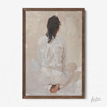 framed artwork depicting an abstract woman sitting with her back turned in neutral tones