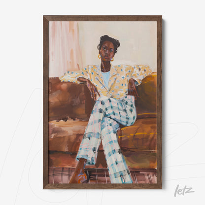 framed portrait of a seated woman on a sofa, wearing a yellow patterned blazer and checked trousers with dark wood frame