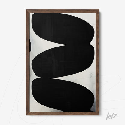 abstract wall art in black and white, framed in a light wood rustic frame