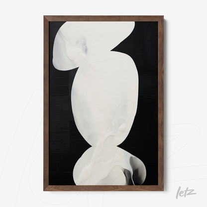 framed abstract art featuring fluid white shapes on a black background with light wood frame