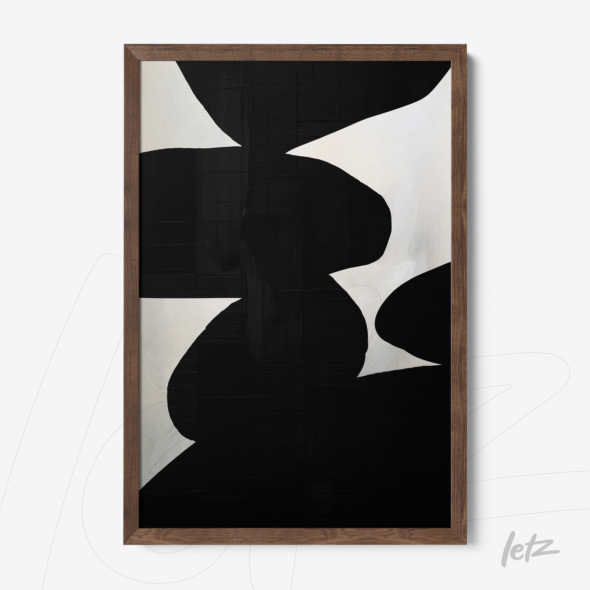 modern wall art featuring abstract shapes in black and white with a dark wood frame