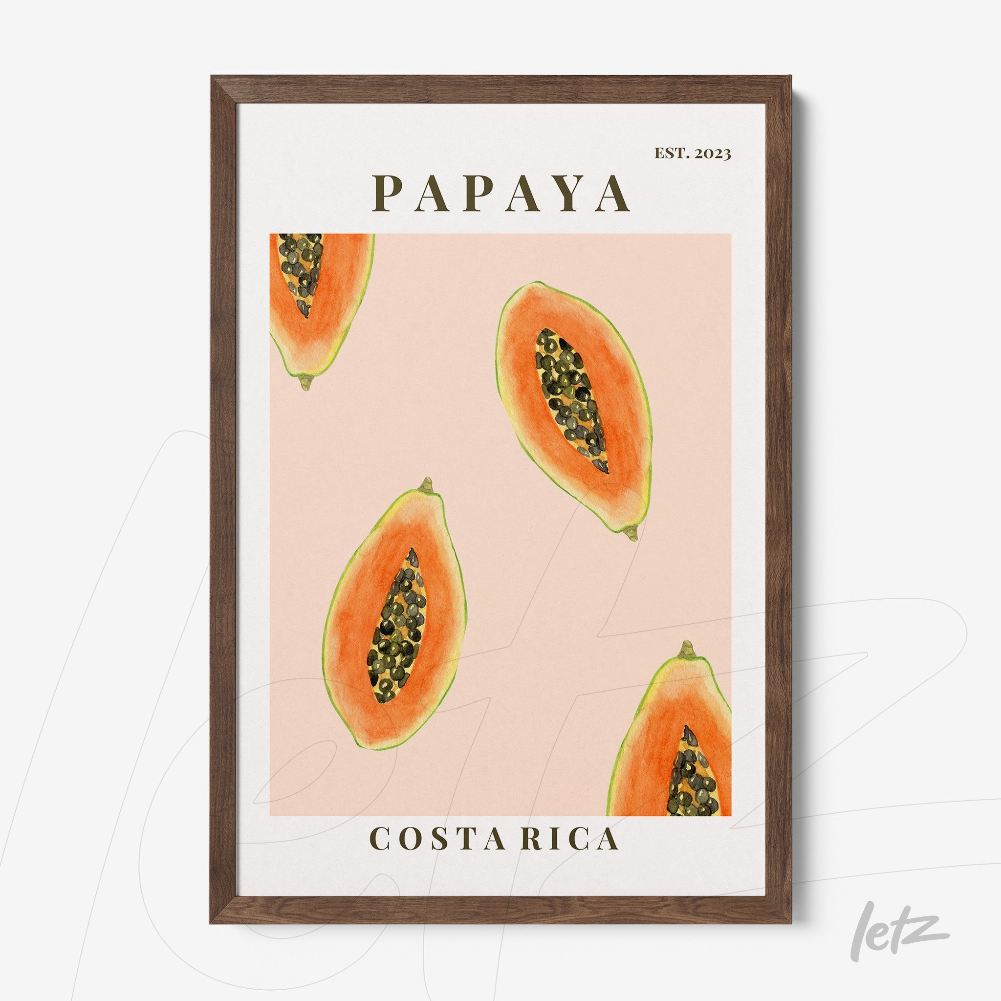 wall art featuring papaya illustrations on pink background with dark wood frame and bold text