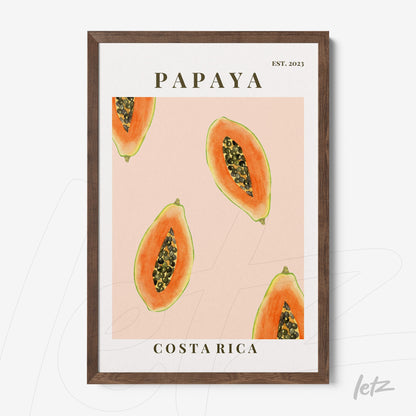 wall art featuring papaya illustrations on pink background with dark wood frame and bold text
