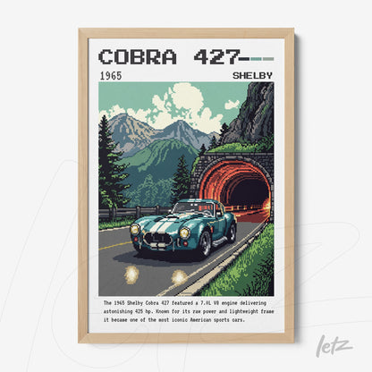 retro art print of a Shelby Cobra 427 vintage sports car in light wood frame with mountains and tunnel background