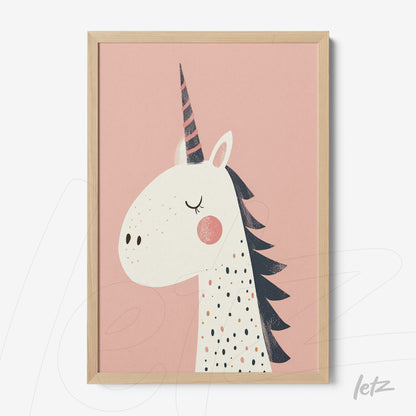 framed art featuring a playful unicorn illustration on a pink background with light wood frame