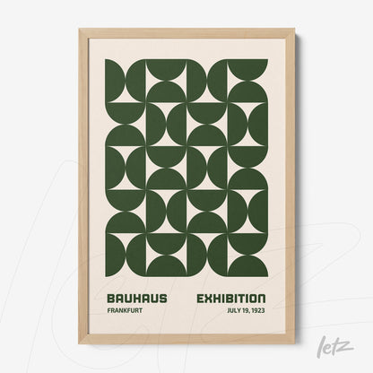 poster featuring green geometric design in light wooden frame