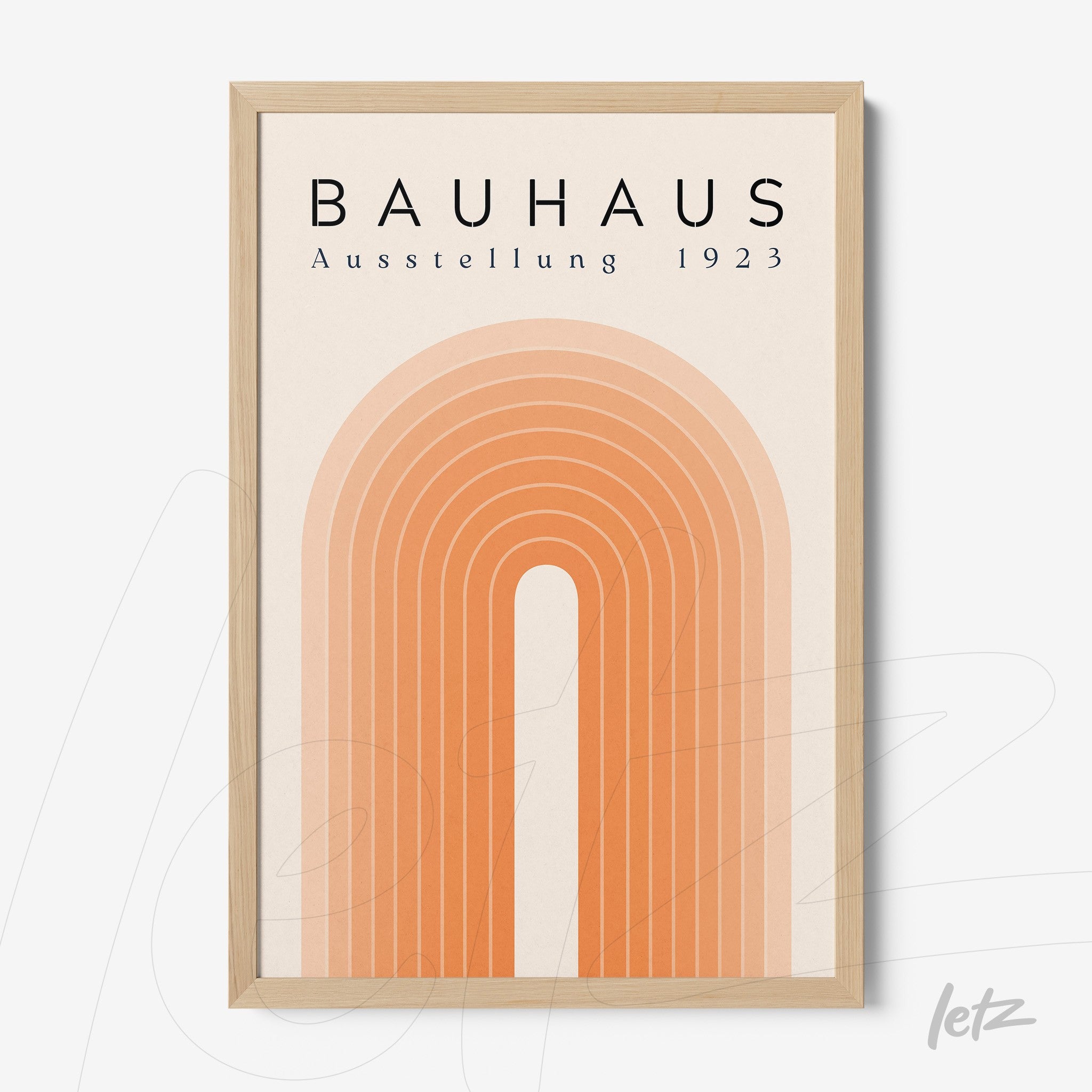 framed Bauhaus school art with orange concentric arches in light wood frame