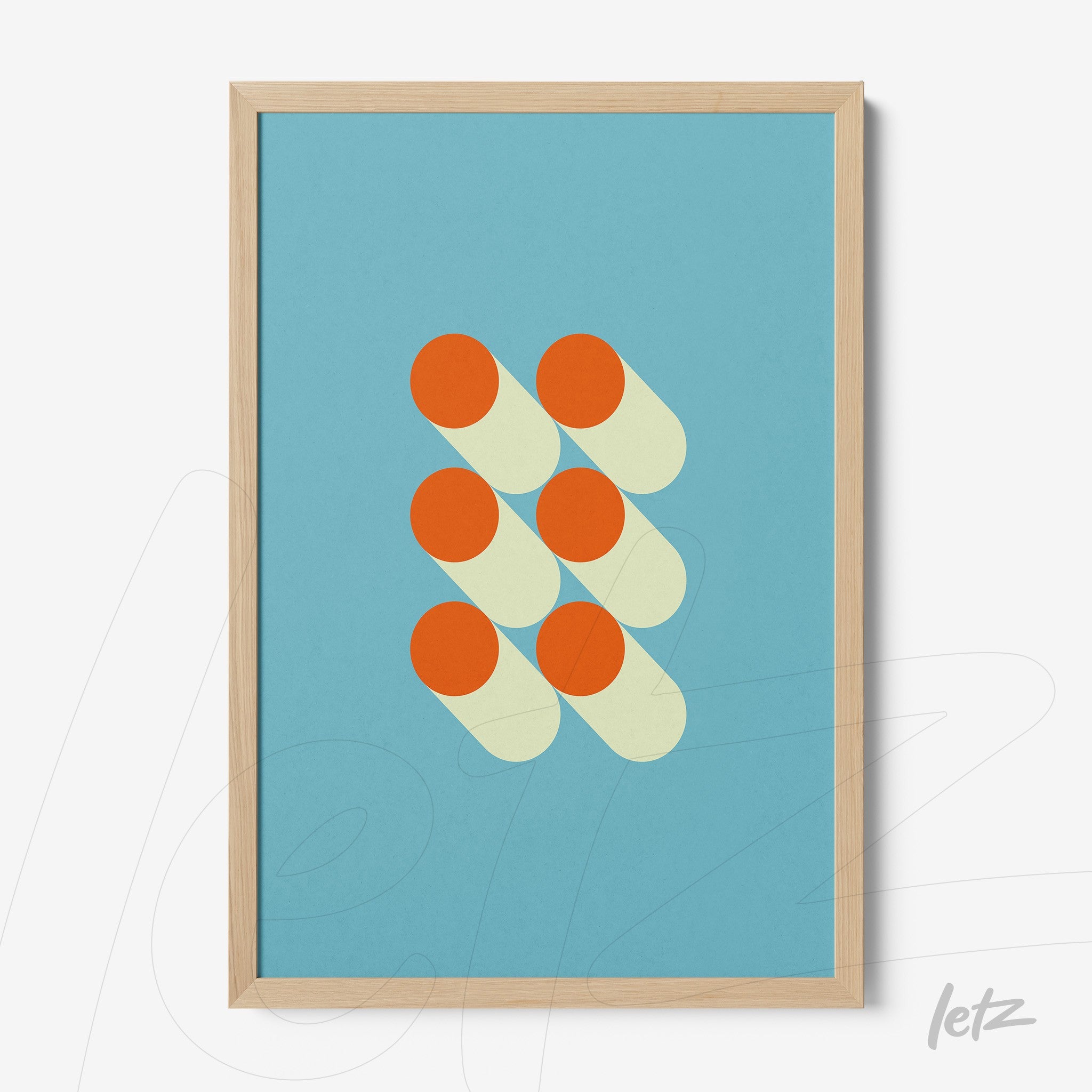 poster print with geometric art in blue featuring orange circles and light wood frame