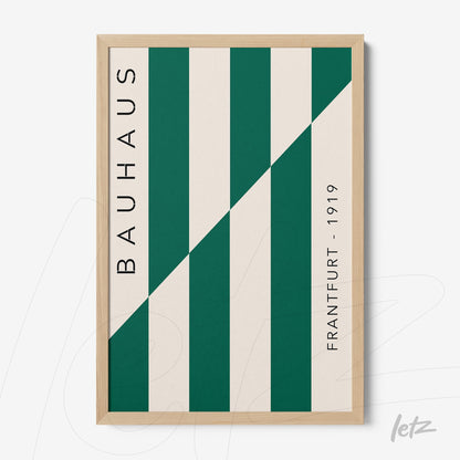 geometric art with vertical green and white stripes in light wood frame featuring text 'bauhaus' and 'frankfurt - 1919'