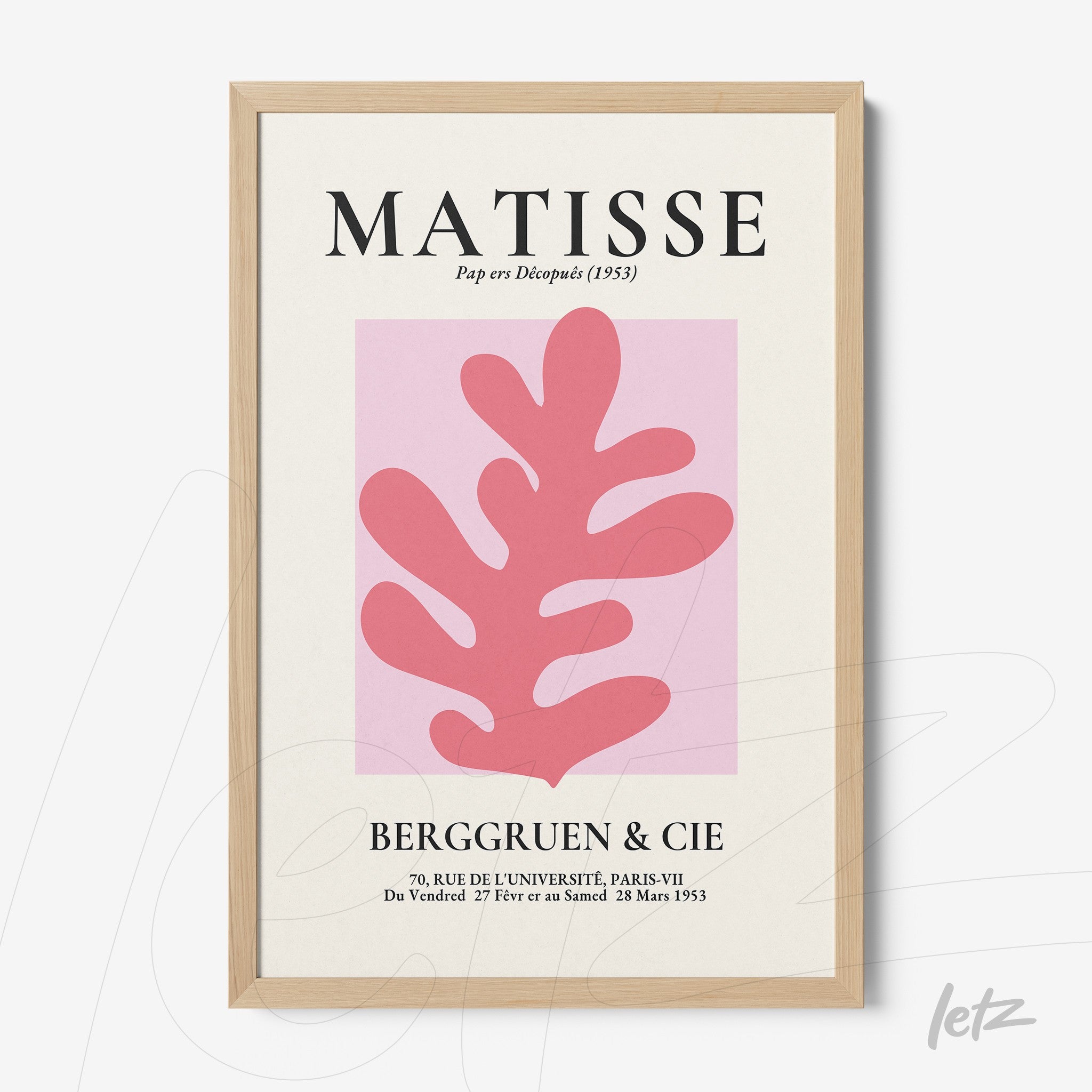 framed art inspired by Matisse featuring a pink leaf against a light pink background with a light wood frame
