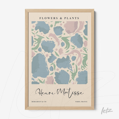 framed wall art featuring abstract flower design in pastel colors with light wood frame
