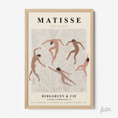 framed wall art featuring stylized dancers in muted colors with light wood frame