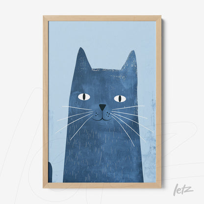 framed wall art featuring a blue cat with a light background and light wood frame