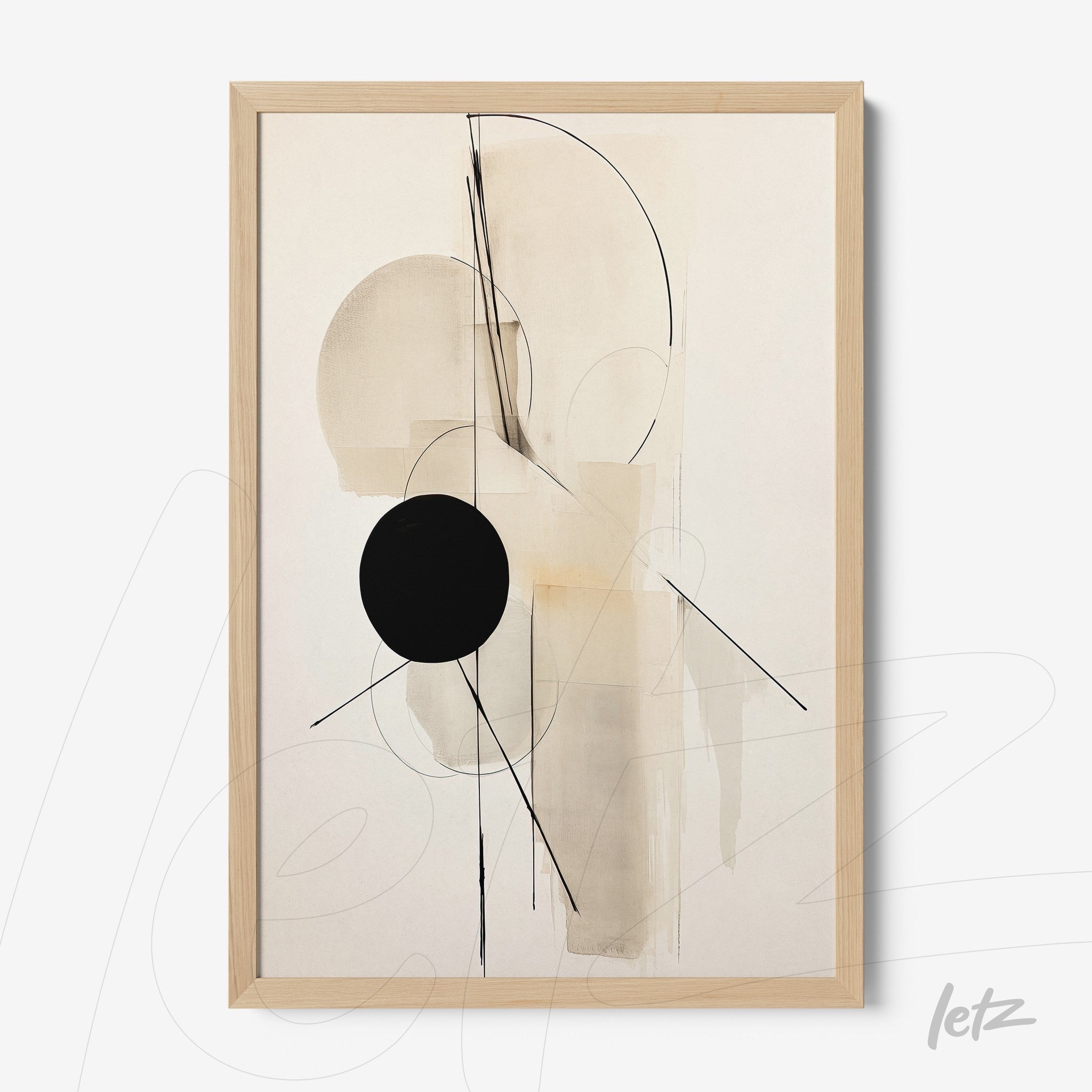 abstract art print in neutral tones with black circles, framed in light wood