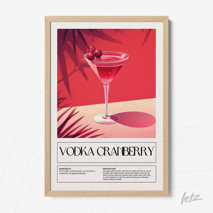 framed art print of a vodka cranberry cocktail in a natural frame with a vibrant red background