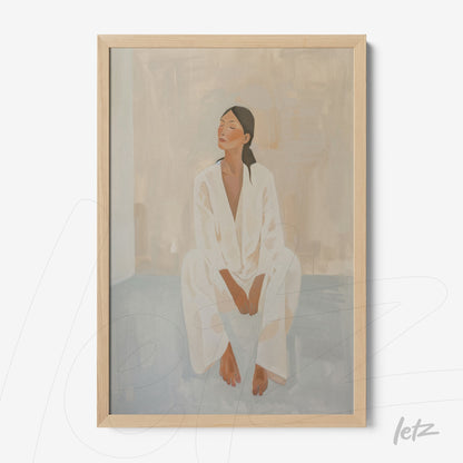 framed artwork of a seated female figure in light clothing with a light wood frame