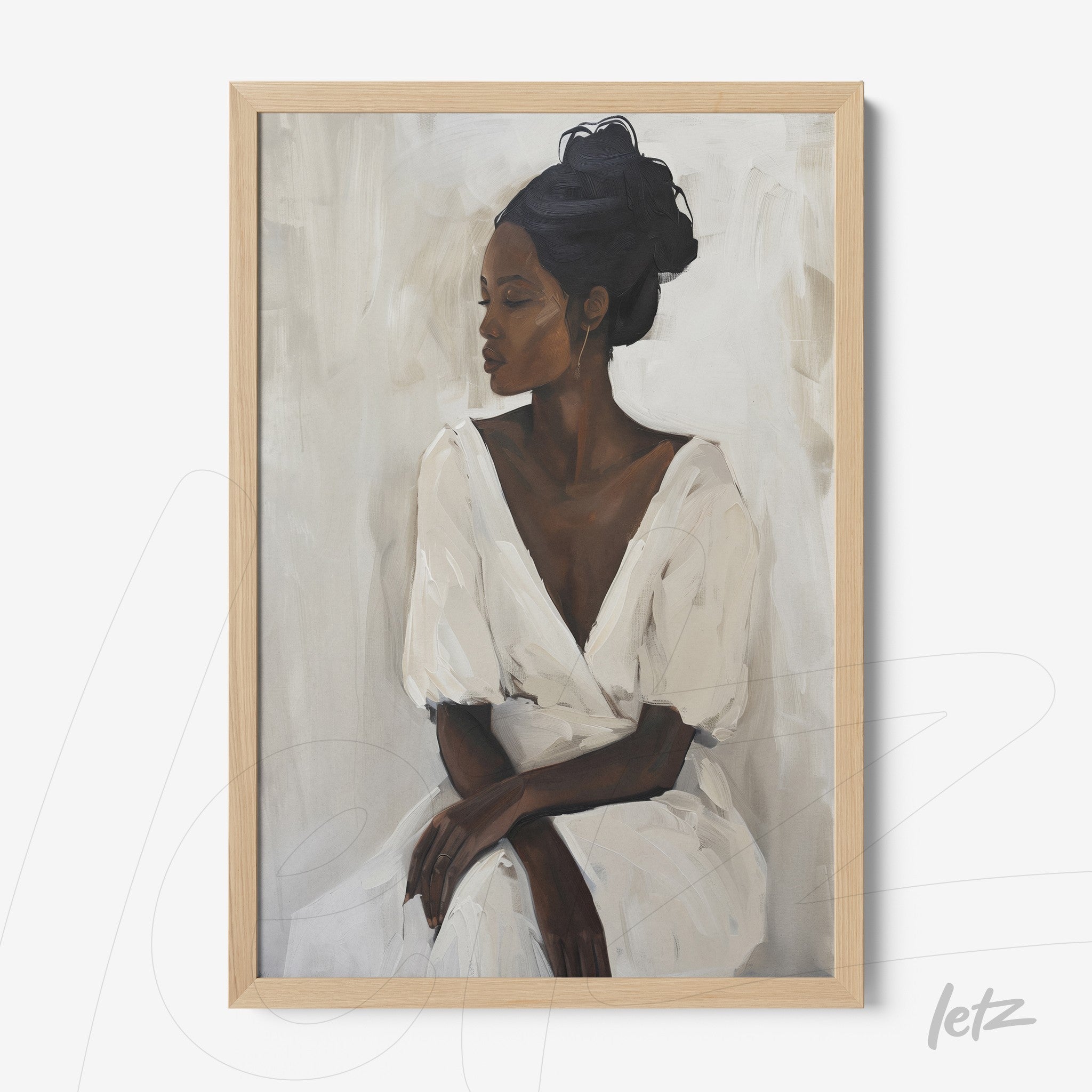 framed portrait of a black woman in a white dress with light wood frame