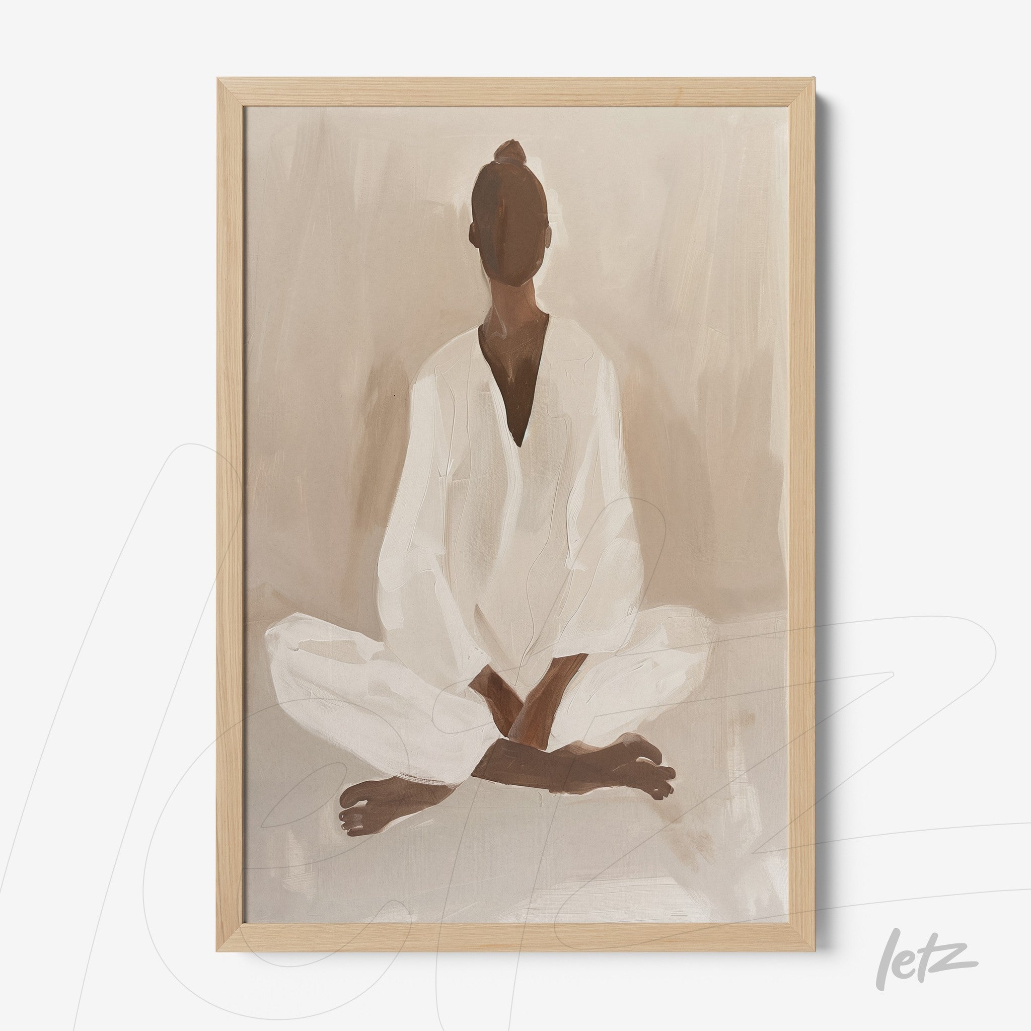 framed abstract art of a meditating figure in neutral tones with light wood frame