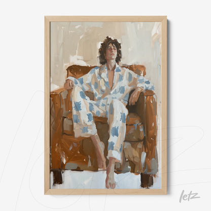 framed artwork featuring an expressive portrait of a man sitting on a brown sofa, wearing a blue floral pajama set