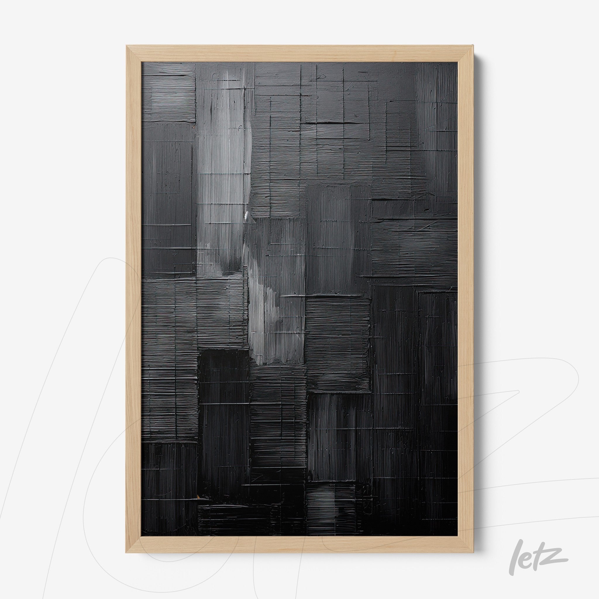 modern art piece featuring abstract black texture in light wood frame
