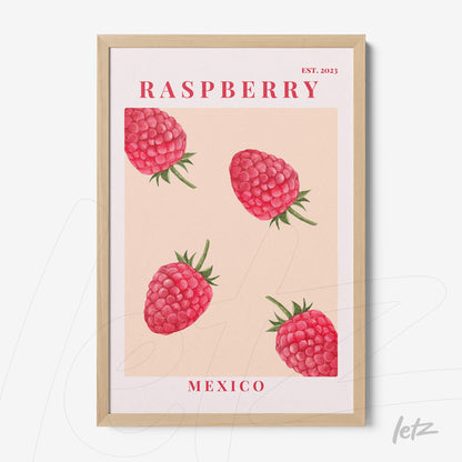 framed wall art featuring illustrative raspberries on pink background with light wood frame