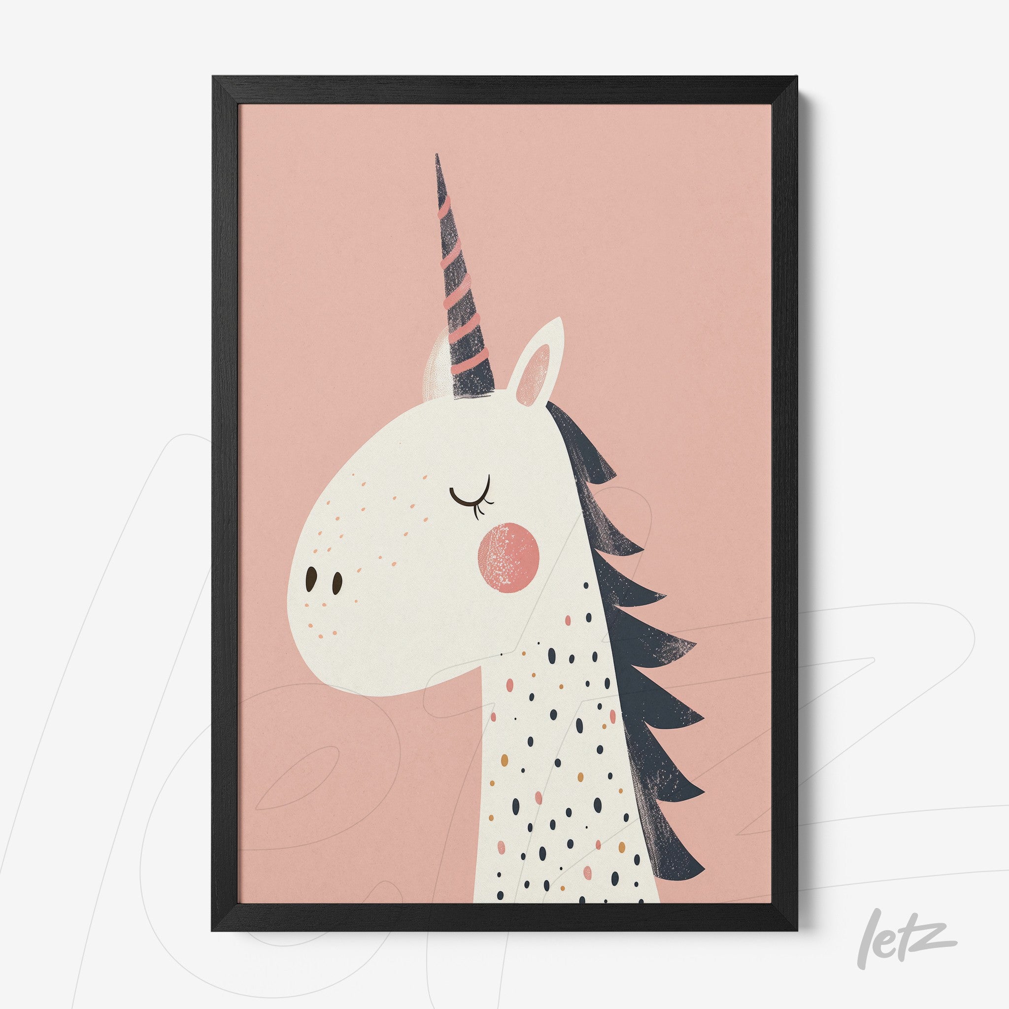 framed artwork featuring a unicorn illustration on a pink background with black frame