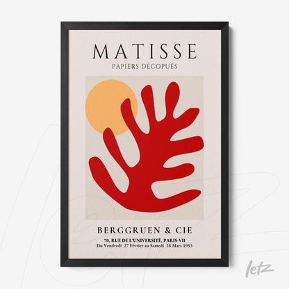 framed modern abstract artwork featuring a light background, a red organic leaf-like shape, and a yellow circle with a black frame
