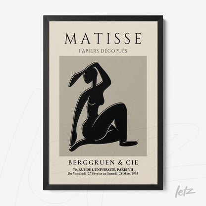framed vintage style artwork featuring a minimalist female figure on a neutral background with black frame