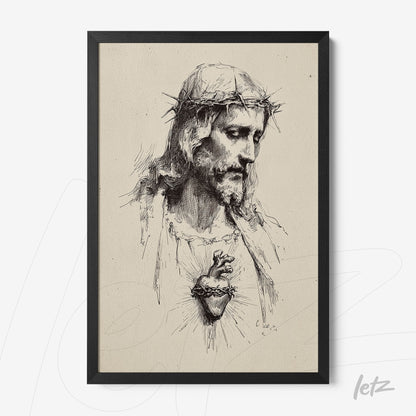 framed wall art featuring a black and white illustration of Jesus Christ with a crown of thorns and exposed heart in black frame