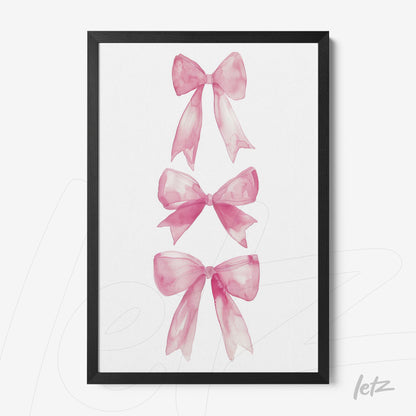 framed watercolor art of pink bows with black frame