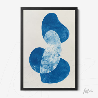 framed art featuring abstract blue shapes with a sleek black frame