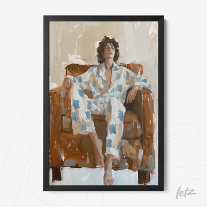 framed wall art depicting a man relaxing on a brown sofa, dressed in blue and white pajamas