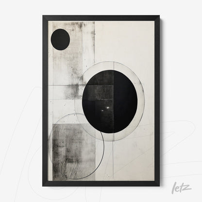 abstract wall art in black and white featuring circular geometric shapes on a light background with a black frame