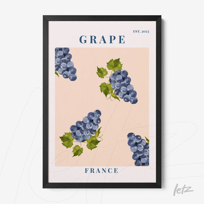 framed wall art featuring grapes on a pink background with black frame