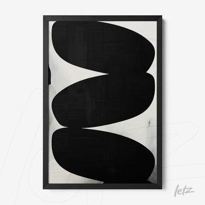 abstract wall art in black and white framed in black frame
