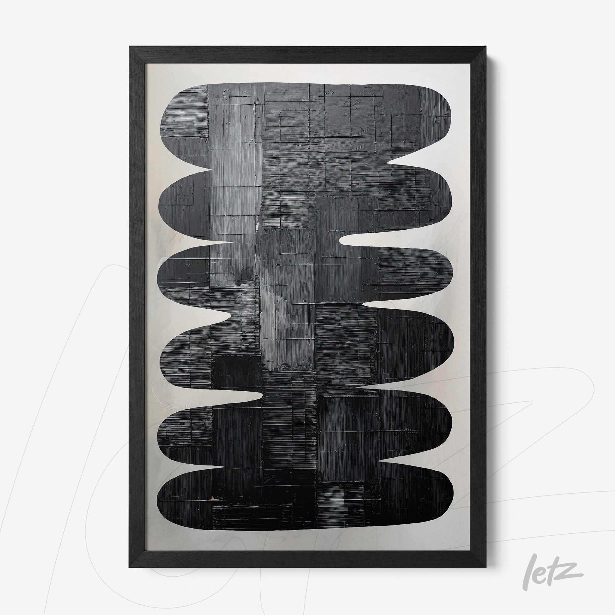 abstract wall art in black tones featuring organic shapes with a black frame