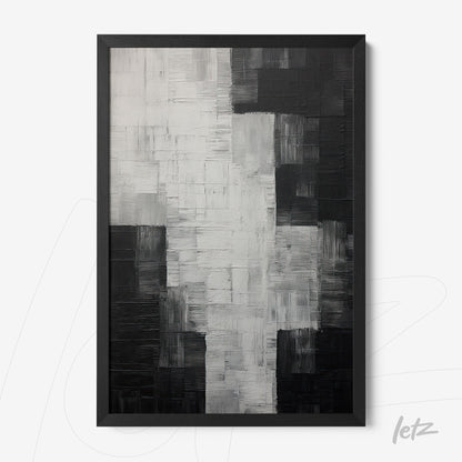 abstract wall art in black and white tones with textured pattern in a black frame