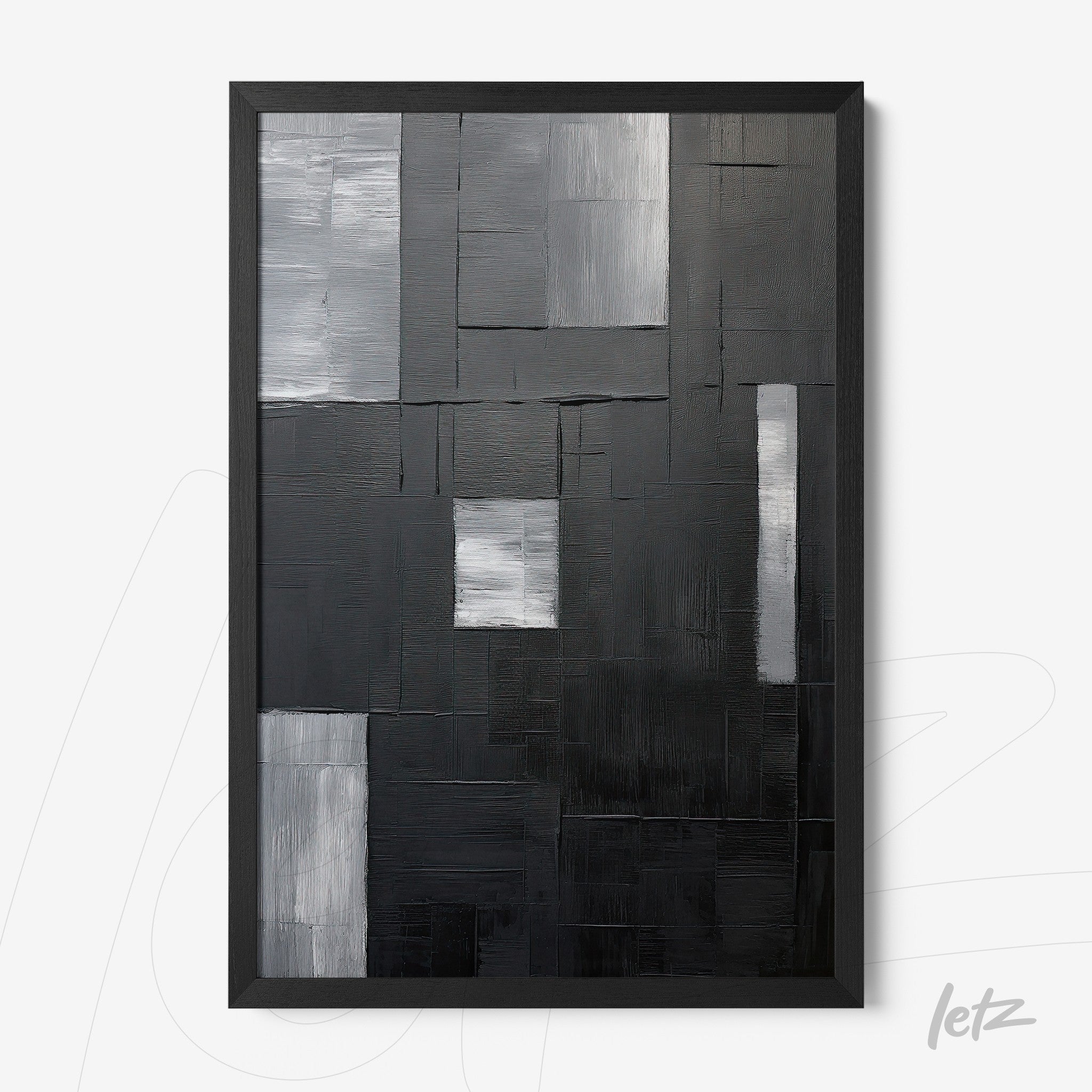 abstract wall art in black and white featuring geometric shapes with varied textures, black frame